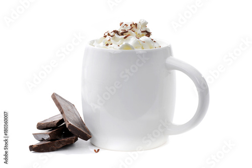 cup of hot chocolate with chocolate pieces on white background