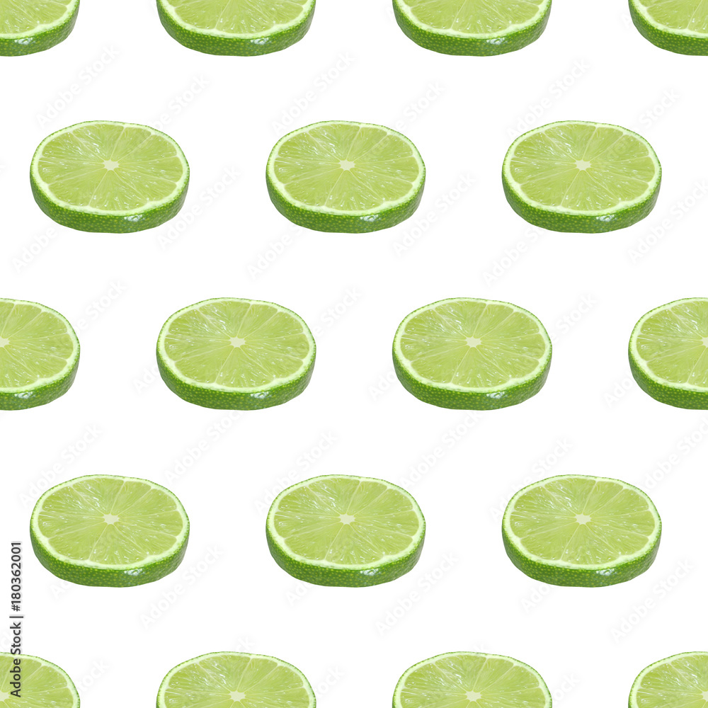 Seamless pattern from cut limes fruits isolated on white background