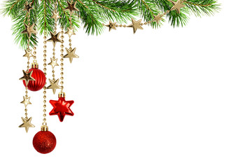 Christmas arrangement with green pine twigs and hanging red decorations