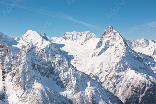 Winter mountains with high peaks. © explorich