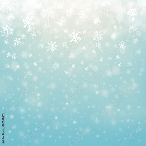 Christmas winter abstract background with snowflakes, bokeh lights and place for text. Christmas New Year's wallpaper © Sergey
