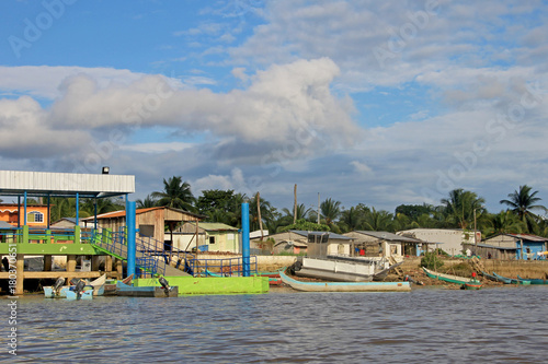 Traditional fishing boats and houses, Cayapas River, Esmeraldas province, Ecuador, South America photo