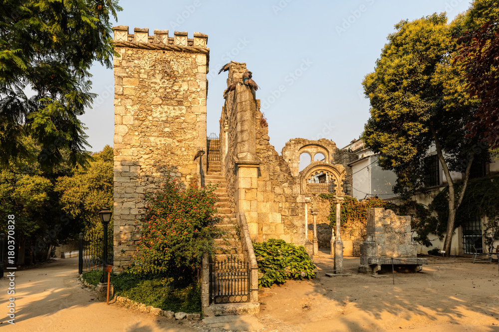 Fake Ruins in the Evora Public Park in Portugal, built in the 1860s using materials from the ruins of several other local monuments, mostly remains of twinned windows in Manueline and Mudejar styles