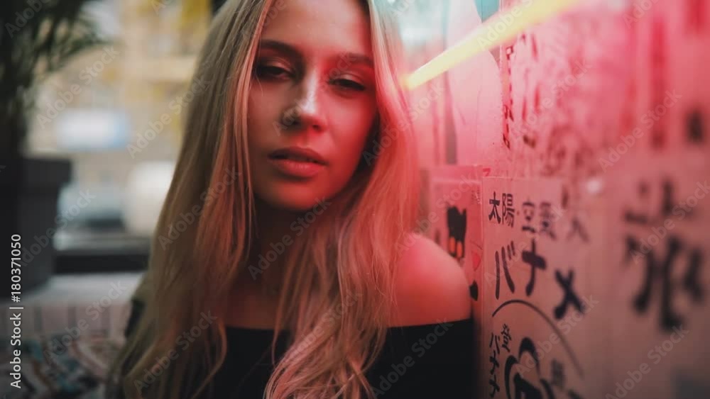 Sexy woman posing in red light cafe Sexy woman posing in red light cafe