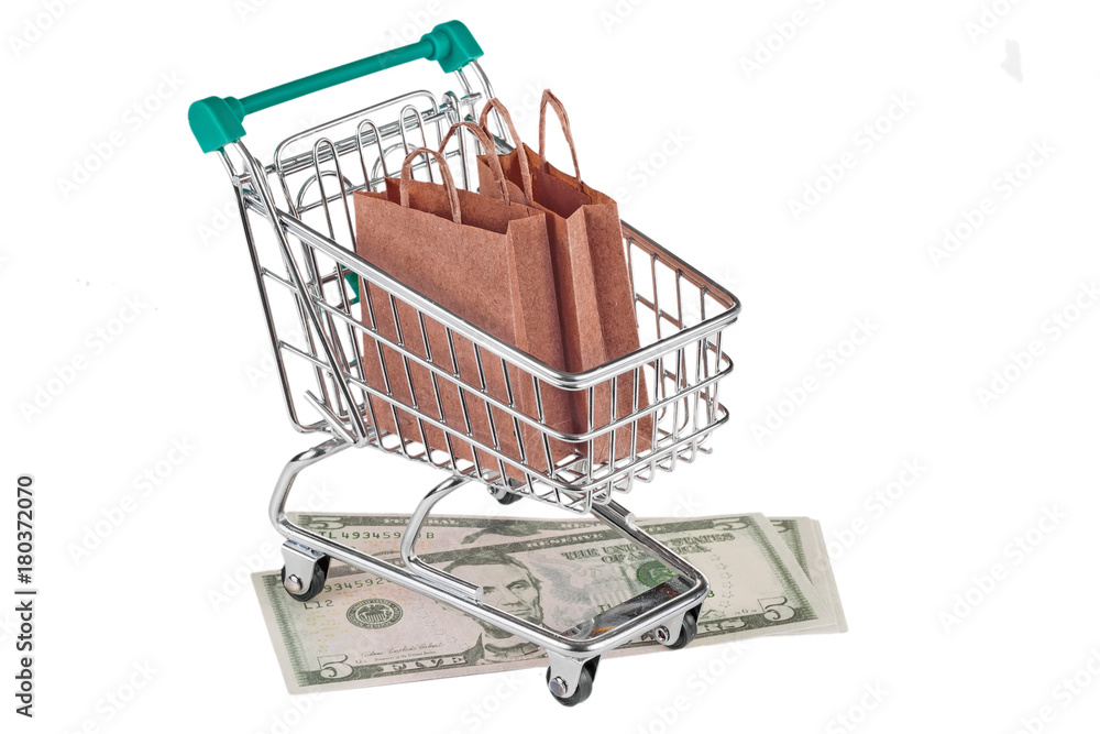 Shopping trolley with packages and dollars