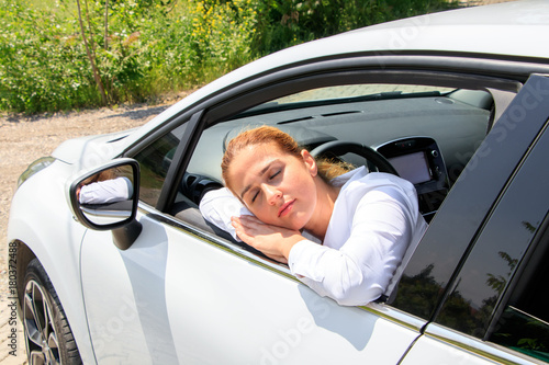 Woman is driving her car