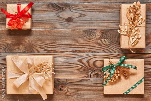 Christmas presents on wooden background