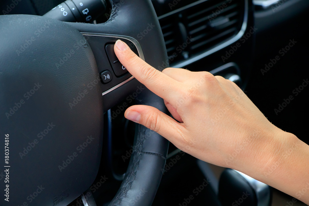 Function button on steering wheel