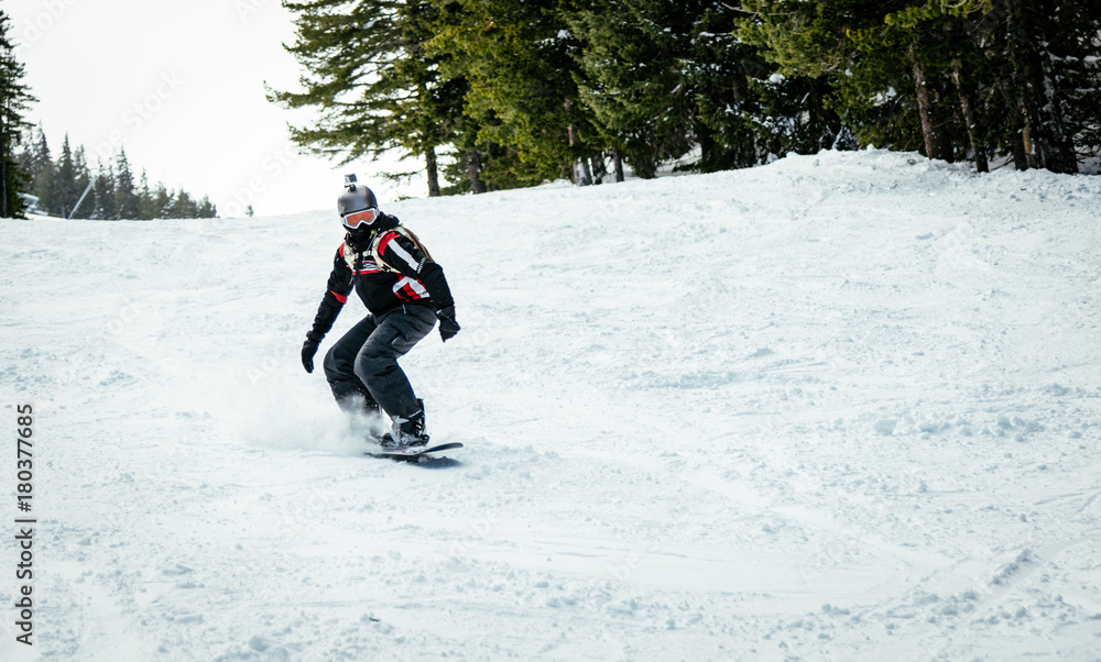 Snowboarder In Action