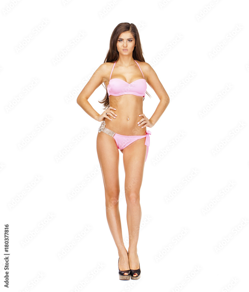 Snap model. Full length portrait of young woman wearing pink bikini Snap model. Full length portrait of young woman wearing pink bikini