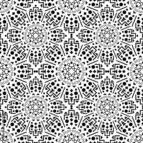 Ethnic black seamless pattern on a white background. Repeated  ornament  in style boho.