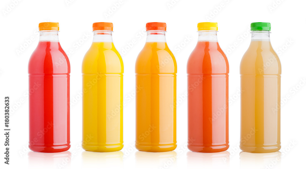 Plastic bottles with fresh organic juice on white Plastic bottles with fresh organic juice on white
