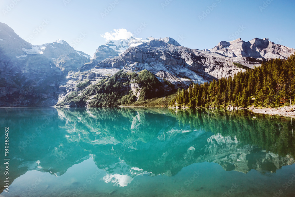 Fototapeta premium Panorama of the azure lake Oeschinensee. Swiss alps, Kandersteg.