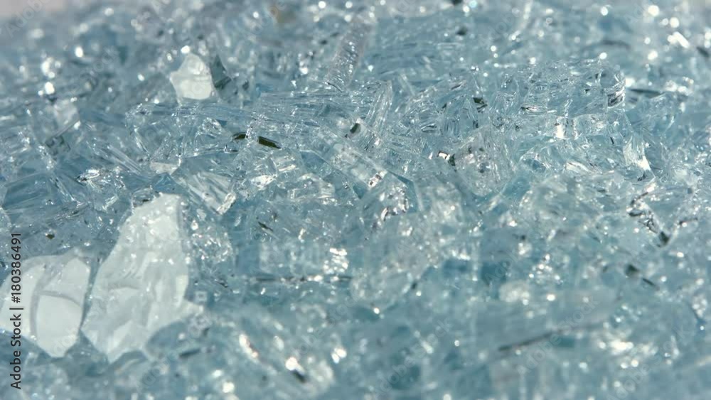 Shards of glass lie on the table. Close up Shards of glass lie on the table. Close up