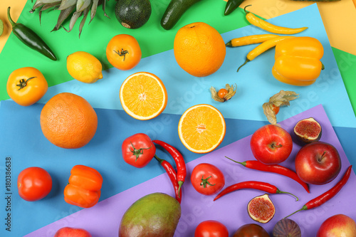 Fototapeta Naklejka Na Ścianę i Meble -  Many different fruits and vegetables on rainbow background