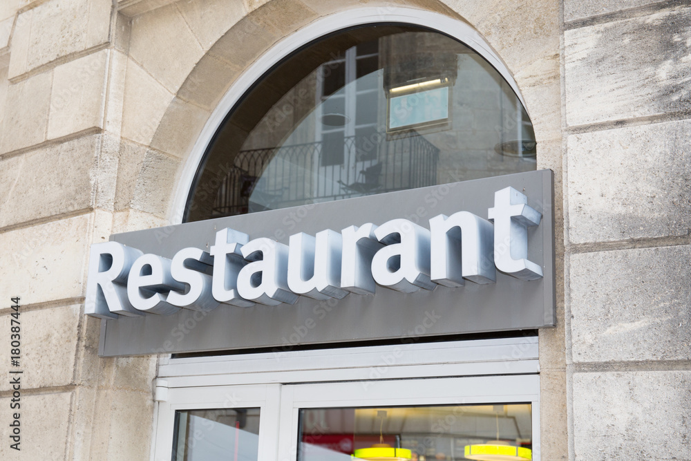 art deco neon restaurant sign on a city street storefront Stock Photo |  Adobe Stock