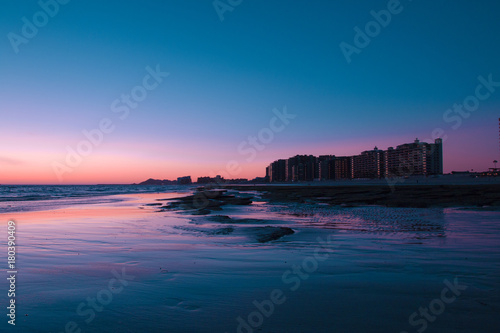 Sunset over a rocky beach in front the hotels at Puerto Penasco (Rocky Point) Mexico.