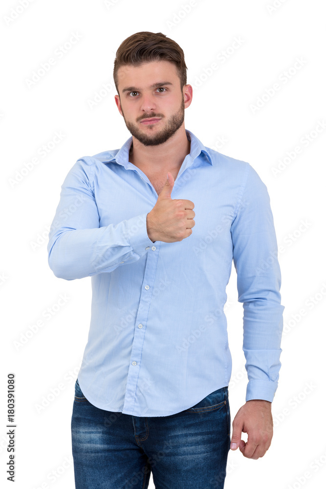 Fototapeta premium Portrait Of A Happy Young Man Showing Thumb Up Sign Isolated On White Background.