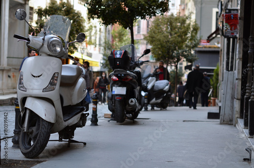scooter parked on street © Oleksandr