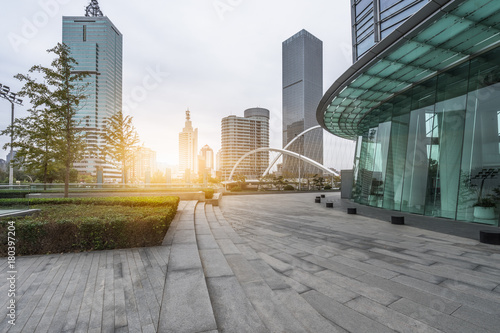 Panoramic skyline and buildings with empty square floor.