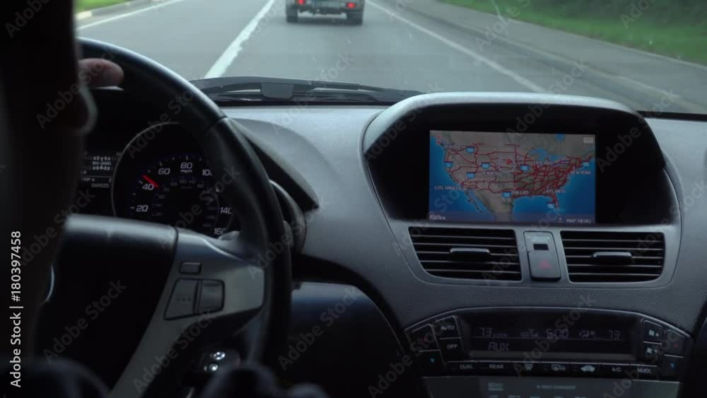 Inside a car. A GPS module is on. Close-up shot Inside a car. A GPS module is on. Close-up shot