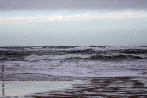 Waves on a beach in the town of Hirtshals in Denmark.