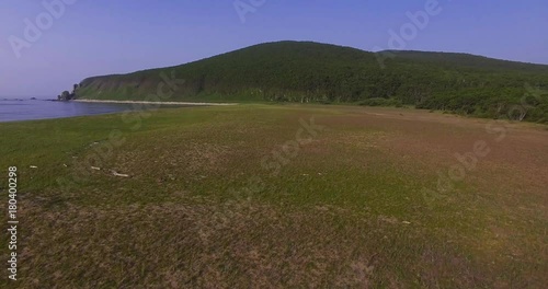 Descending aerial view of the birdman house near lake Blagodatnoye at the Sikhote-Alin Nature Reserve in Russian Far East. It has been inscribed on the UNESCO World Heritage List since 2001. photo
