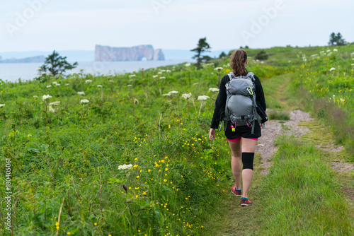 Woman trekking in Bonaventure Island, Quebec, Canada