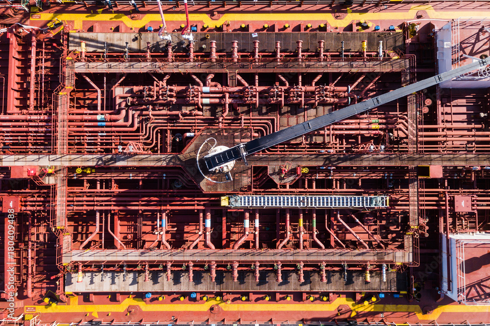 Oil and Chemical pipes layout on a large tanker - Top down aerial view