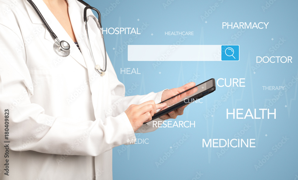 Female doctor with tablet Female doctor with tablet