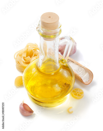 bottle of oil and pasta at white