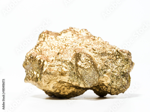 huge gold gemstones on white blurred background, precious stone