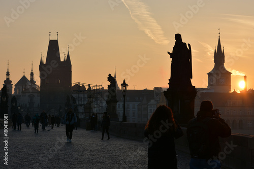 Dawn on the Charles Bridge in Prague.