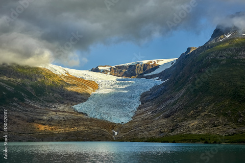 Lake Svartisvatnet in Helgeland; Nordland; Norway, with Svartisen glacier in the background photo