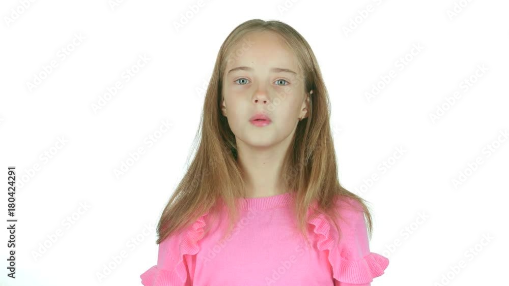 Child sends an air kiss. White background Child sends an air kiss. White background