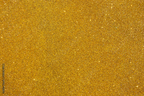 Gold glitter vintage lights background. de focused.