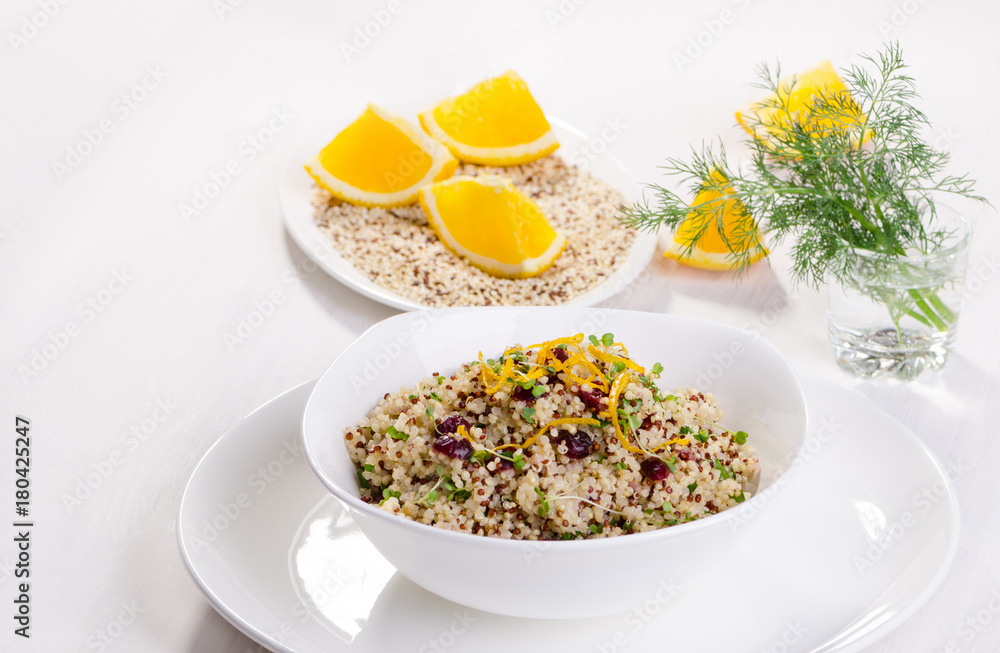 Quinoa salad with cranberries and orange. Superfoods concept. Quinoa salad with cranberries and orange. Superfoods concept.