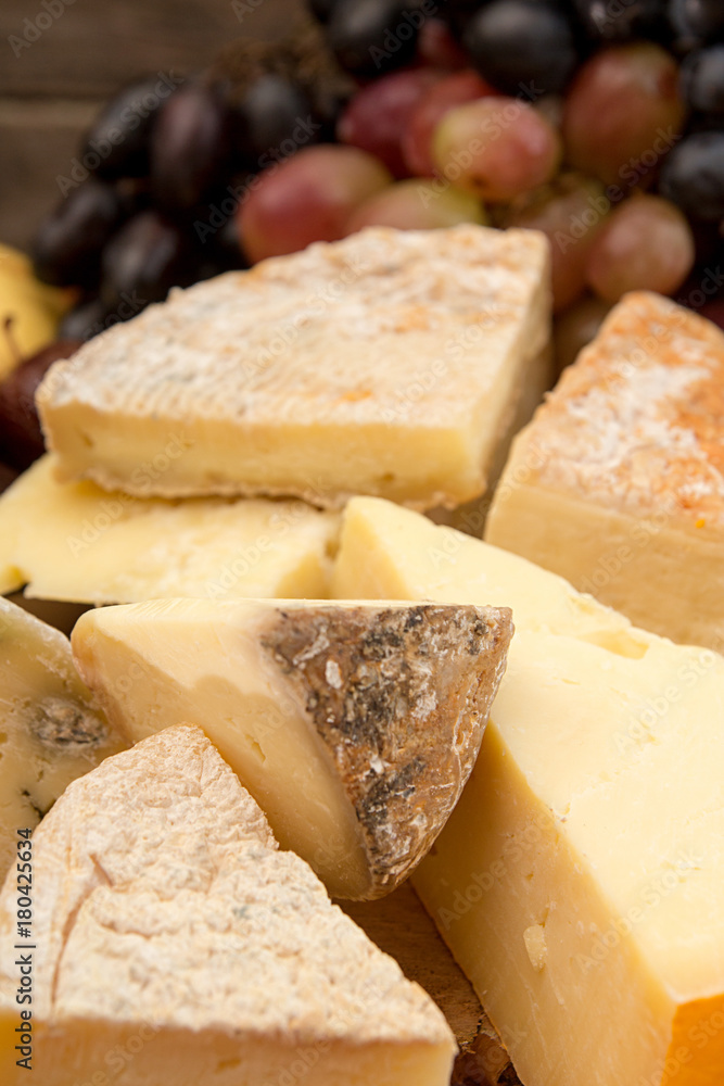 Moldy cheese blocks and grapes Moldy cheese blocks and grapes