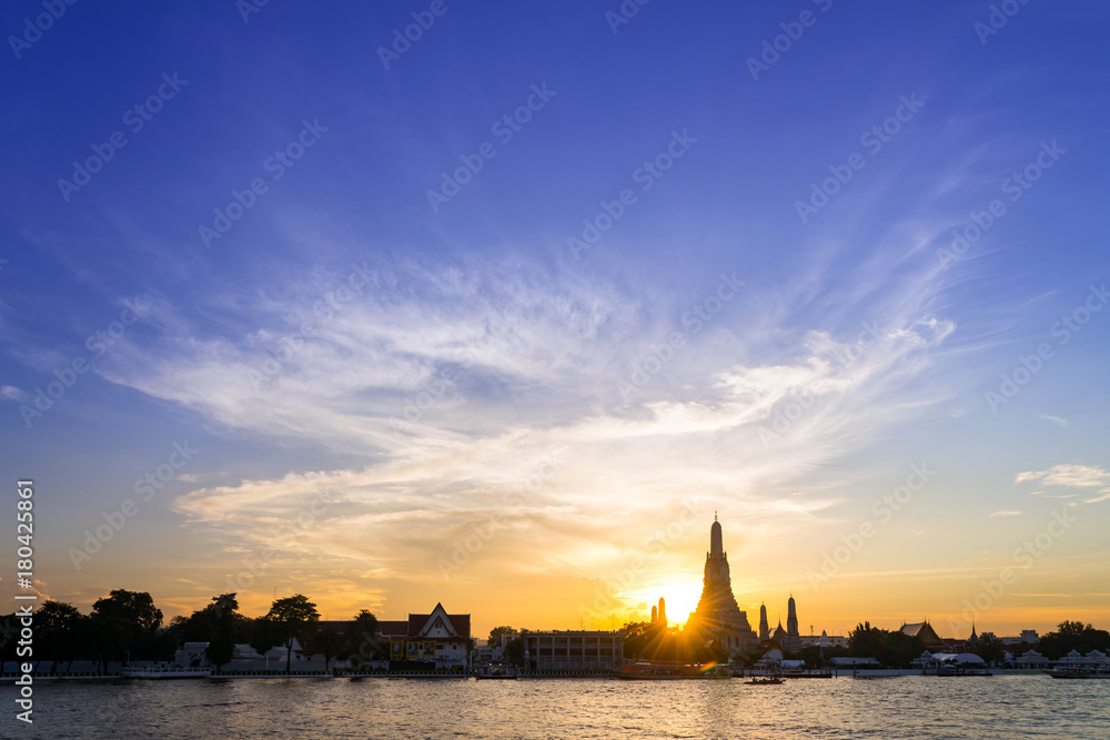 Sunset silhouette of Wat Arun (Temple of Dawn) is landmark of Attractions's Popular tourists, in bangkok Thailand