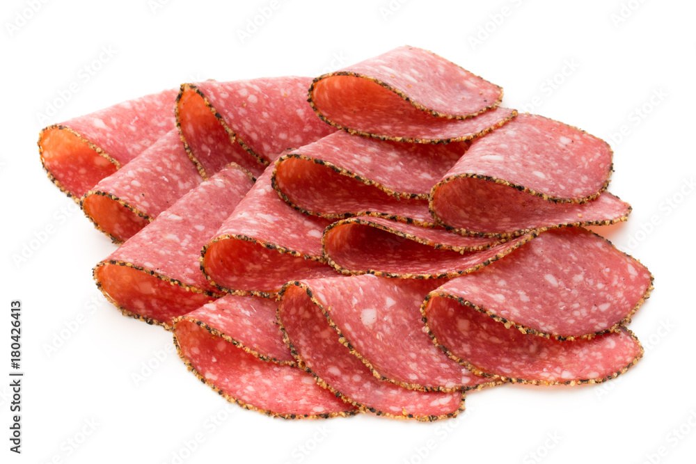 Salami slices isolated on the white background. Salami slices isolated on the white background.