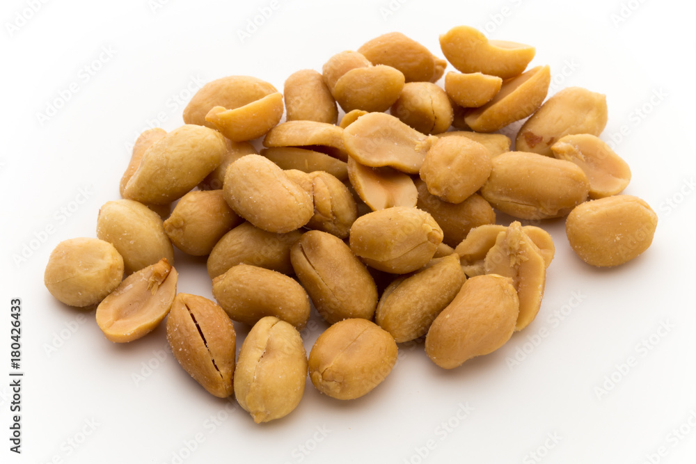 Peeled peanuts on the isolated background. Peeled peanuts on the isolated background.