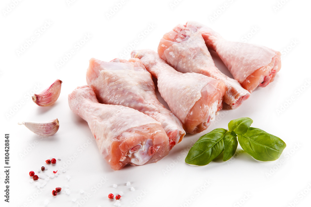 Raw chicken legs on white background Raw chicken legs on white background