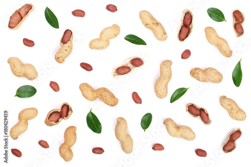 Peanuts with shells isolated on white background, top view. Flat lay pattern