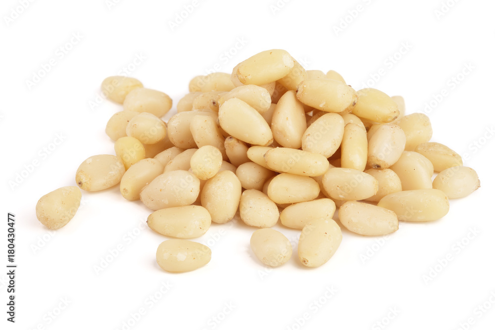 Shelled cedar pine nuts isolated on white background Shelled cedar pine nuts isolated on white background