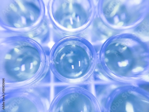 Blurred background -blue solution in glass tube in laboratory