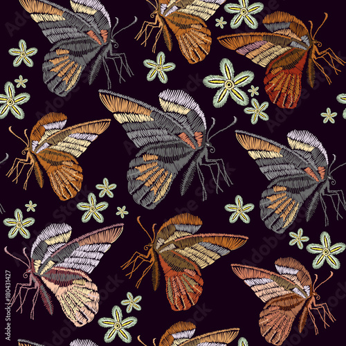 Butterflies and flowers embroidery seamless pattern. Beautiful vintage butterflies classical embroidery seamless background template for clothes, textiles, t-shirt design
