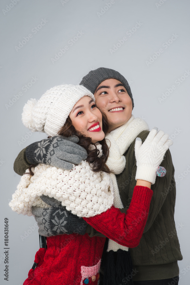 Happy young hipster couple hugging. Cold season. Romantic mood. Happy young hipster couple hugging. Cold season. Romantic mood.