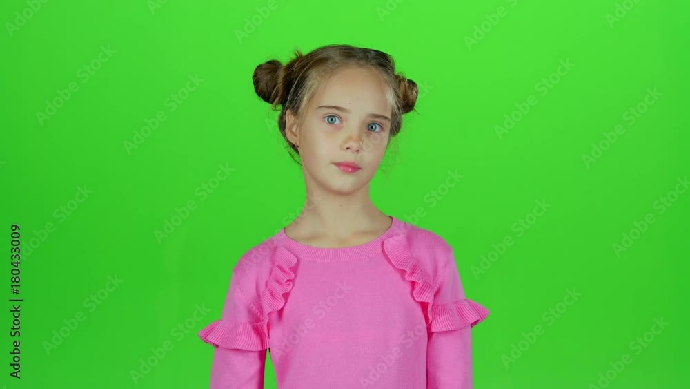 Baby is sad, she was riddled with unpleasant news. Green screen. Slow motion Baby is sad, she was riddled with unpleasant news. Green screen. Slow motion