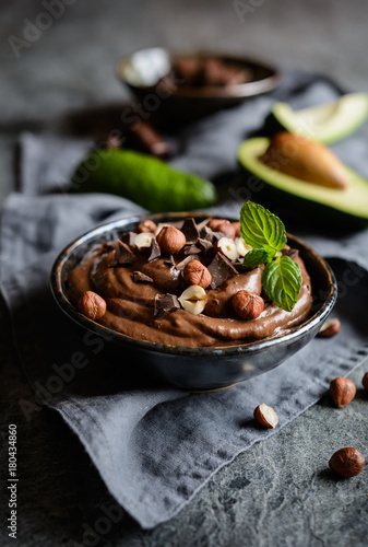 Raw avocado chocolate mousse with hazelnuts