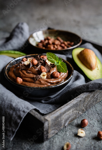 Raw avocado chocolate mousse with hazelnuts